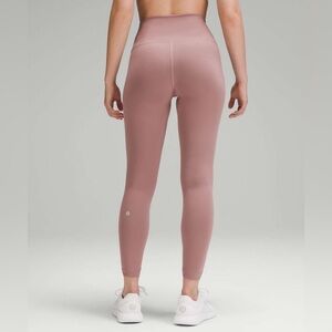 C - Lululemon Wunder Train High-Rise Tight 25"
Twilight Rose